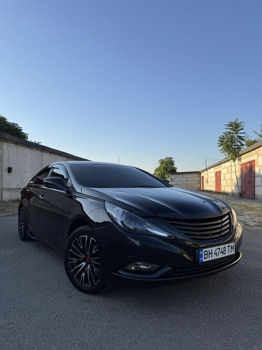 Hyundai Sonata 2013 VIN KMHEC41LBEA592888 фото оголошення 2 з 24
