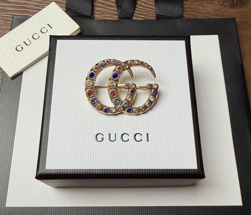 Broszka stare złoto z cyrkoniami