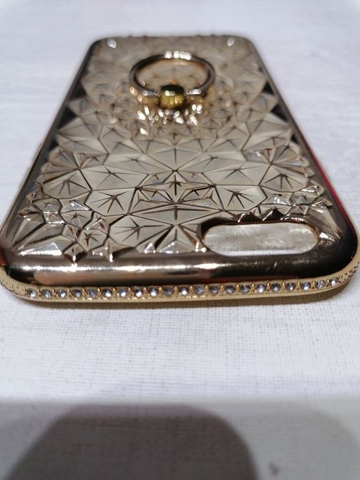 Capa transparente e dourada com anel para IPhone 6S usada
