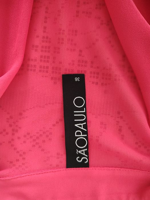 Elegancka kopertowa bluzka w intensywnym różu styl Glamour