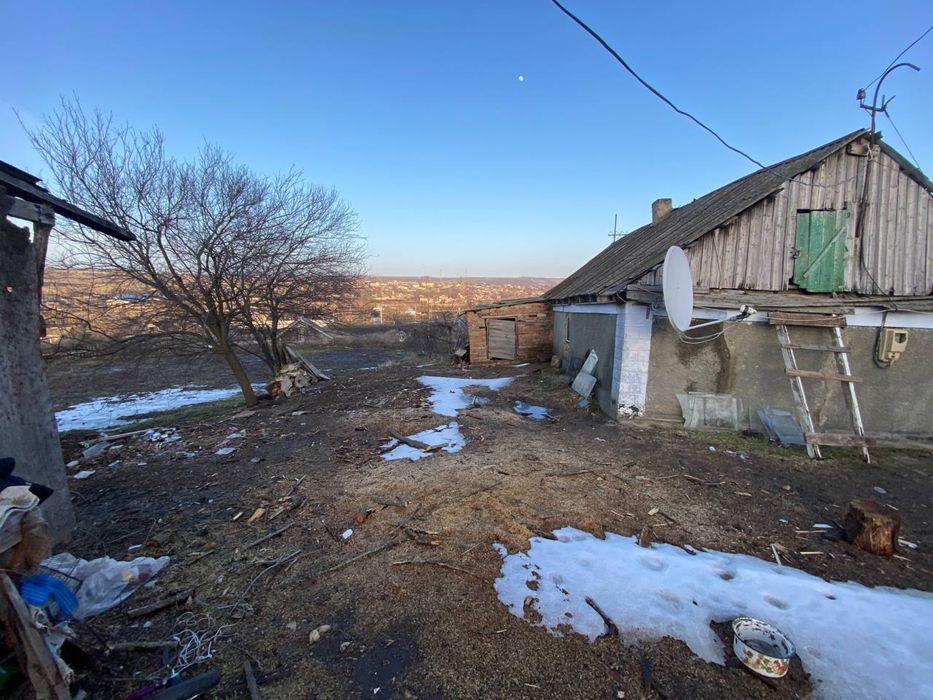 Продам хату та недобудованний будинок