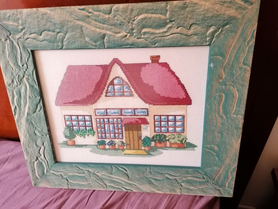 Quatro quadros bordados