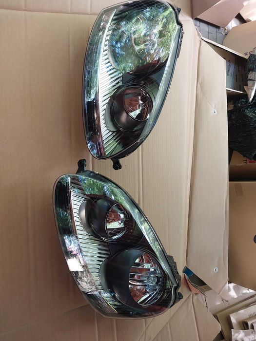 VW GOLF V reflektory lampy nowe CZARNE komplet