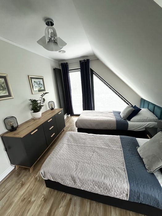 Domek Bielik z jakuzzi  nad jeziorem w Lubniewicach