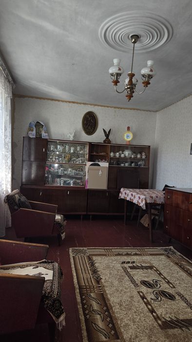 Продаж квартири в 1-поверховому будинку з присадибною ділянкою