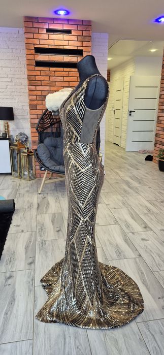 Długa cekinowa sukienka wieczorowa złota