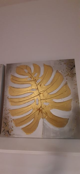 2 obrazy , zloty liść monstery