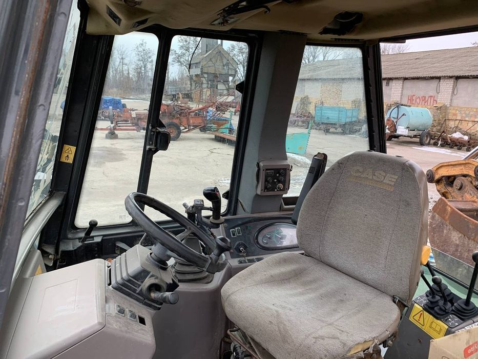 Case 580SM екскаватор навантажувач