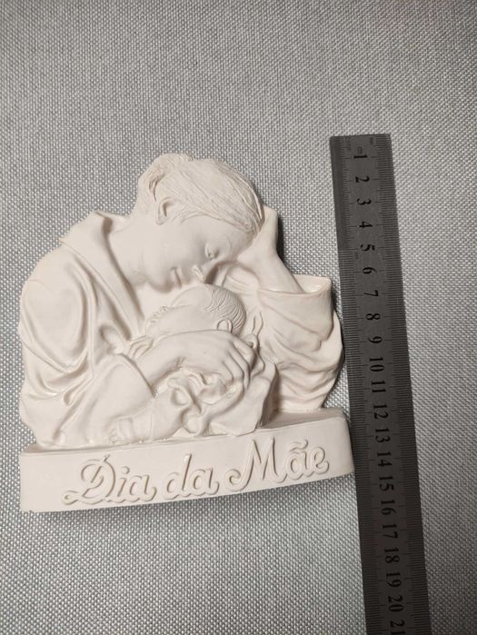 Peça em marfinite para a mãe