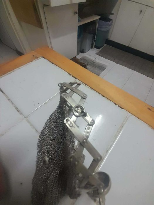 Porta moedas de prata.