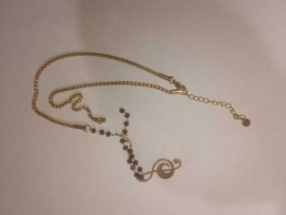 Pulseira Clave de Sol Dourada e Contas Pretas