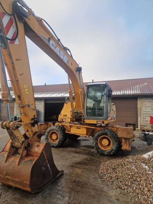 Колісний екскаватор Case WX165