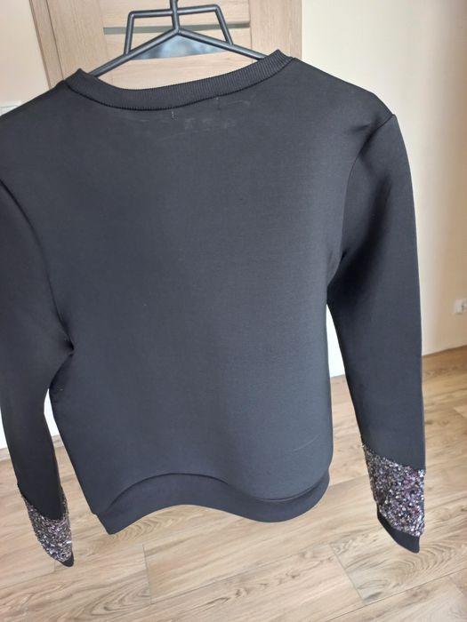 Czarna bluza damska z cekinami pianka 36 38