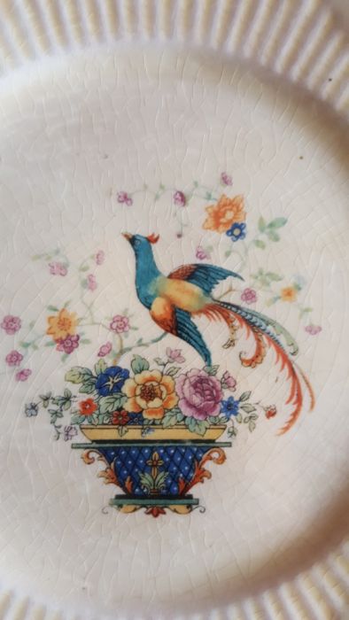 2 pratos muitos antigos. Foram adquiridos numa feira nos USA. Raros.