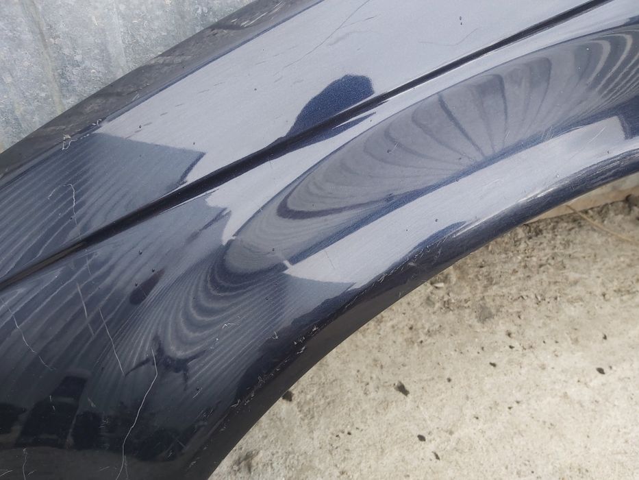 Blotnik lewy e46 coupe