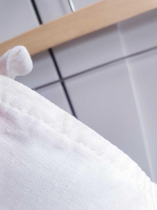 Szerokie lniane spodnie kuloty culotte bermudy białe 40