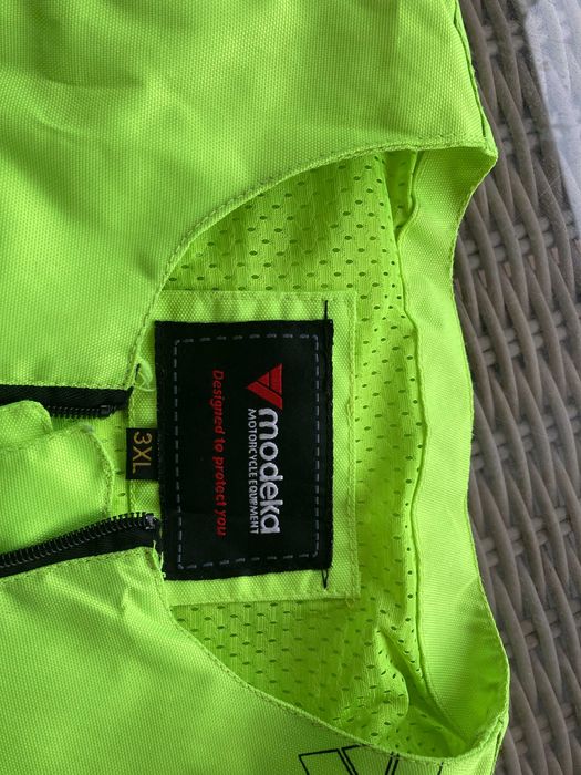 Colete fluorescente para motocicleta