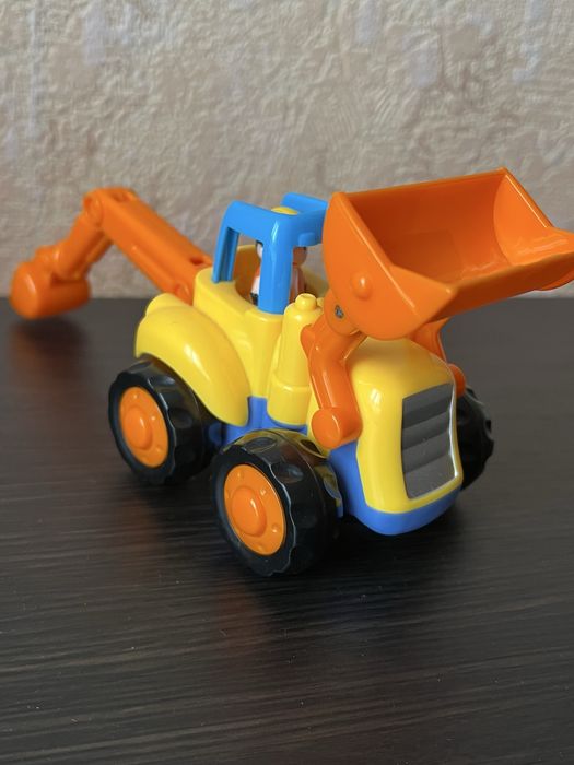 Синій трактор та вся колекція Hola