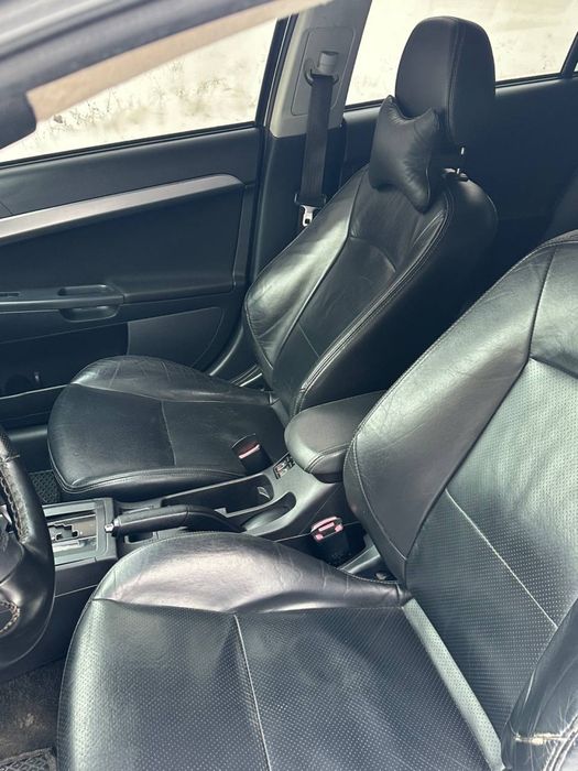 Mitsubishi lancer X автомат кожа на газу