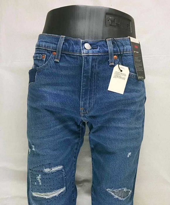 Jeansy Levi's 511 męskie podszyte łaty cerowania nowe Levisy - W31/L34