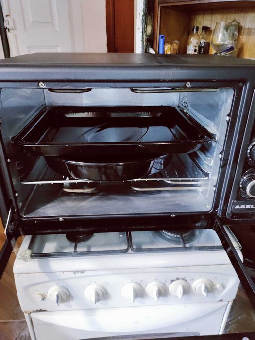 Продам газовую плиту вместе с электродуховкой