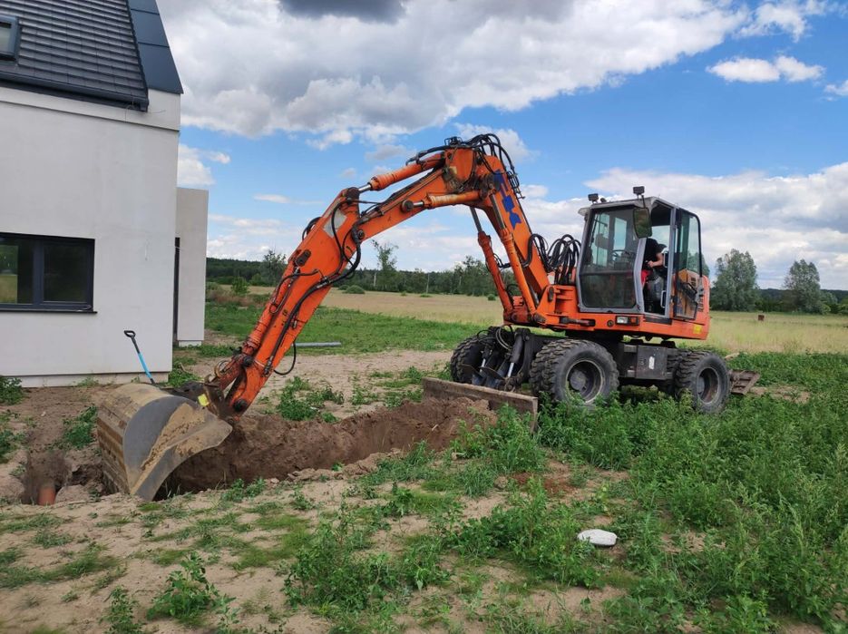 Roboty ziemne/ minikoparka /koparka kołowa 13t