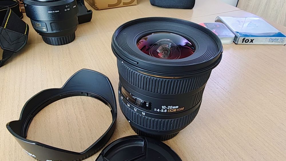 Nikon D5100 + nikkor 18-55mm+nikkor 35 1.8G+sigma 10-20mm