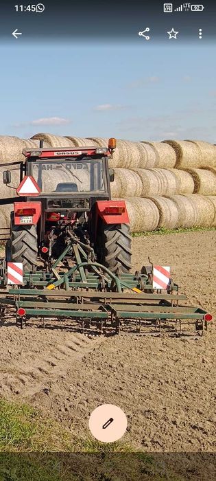 Rozsiewacz RAUCH 700 , 12 m rozsiewu 600 kg ładowności kabina agregat