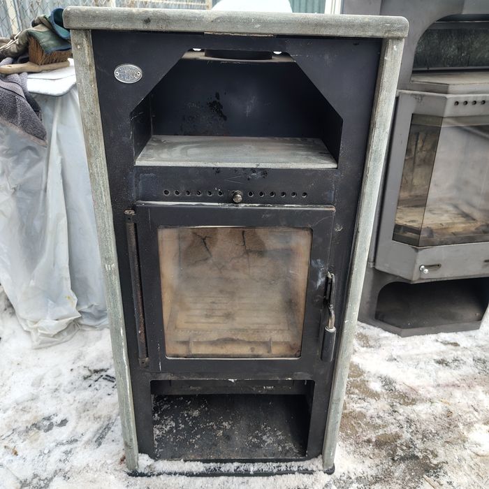 Камін,піч на дровах.Камінофен.