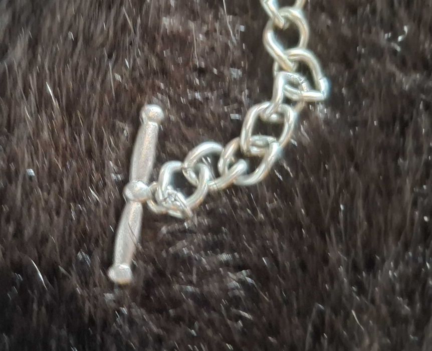 Colar coração com pendentes prateados