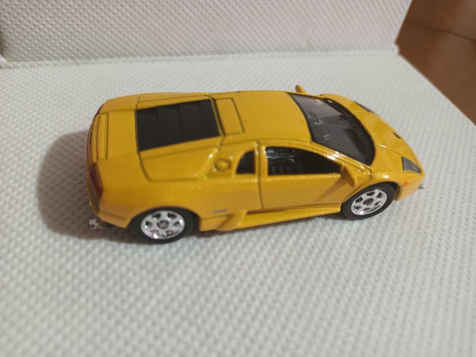 Miniaturas 1/64 Welly P2