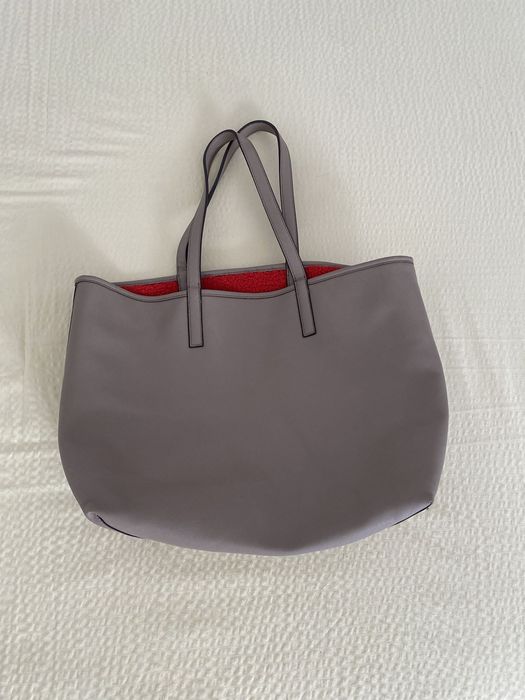Mala reversível com pêlo vermelho