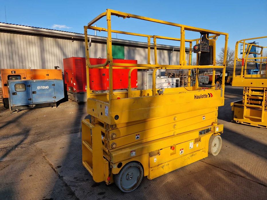 Ножничний підйомник Haulotte Compact 10N, акамуляторний, пеканіска