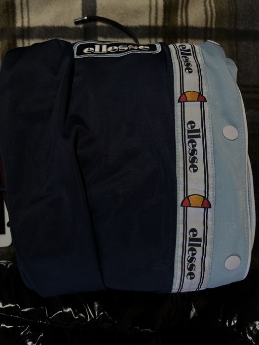 штани Ellesse з лампасами та кнопками з боків