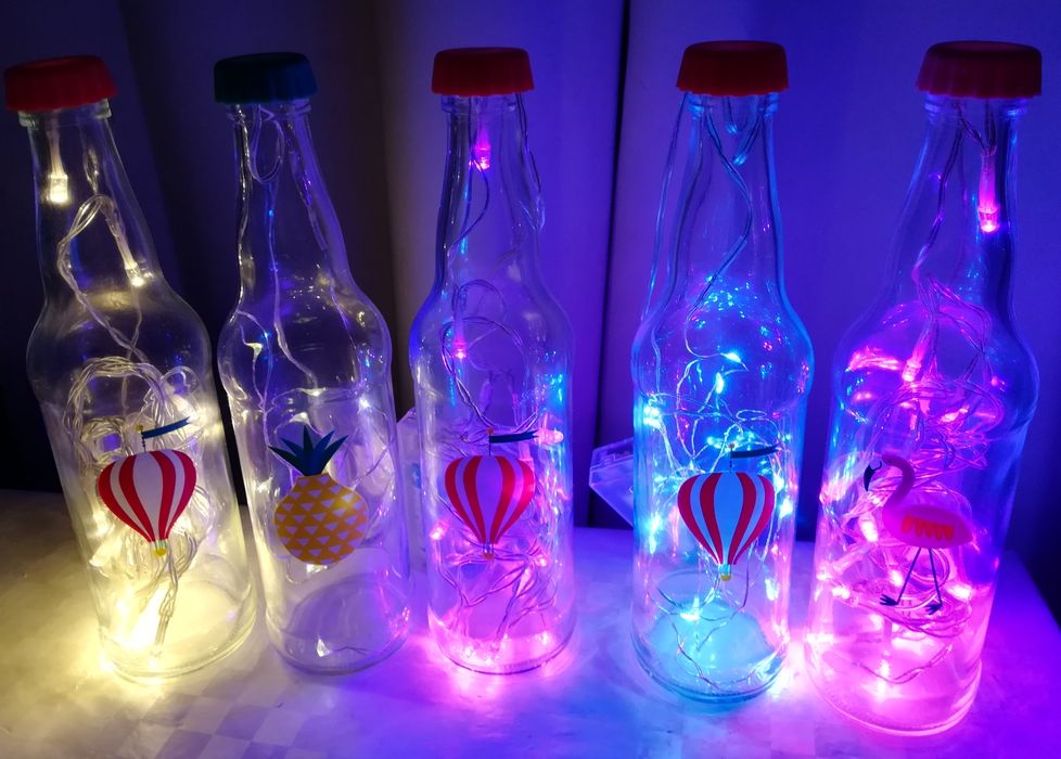 Ofereça de um modo criativo  lâmpadas e/ou garrafas iluminadas