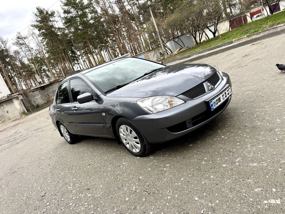 Продам Митсубиси Лансер