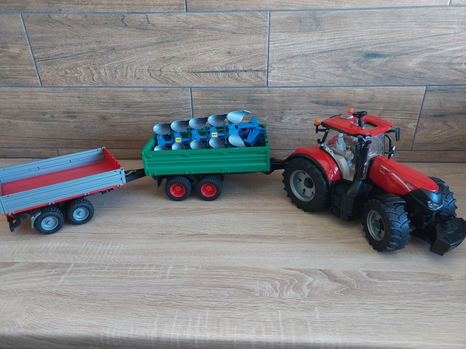 BRUDER  traktor Case IH Optum 300 + 2 przyczepy + pług