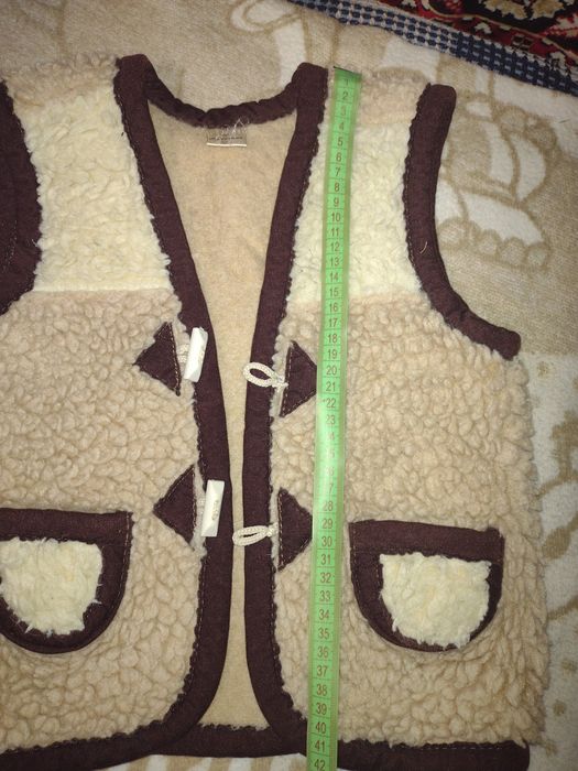 Продам жилетку на овчині