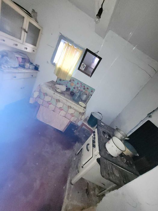 Дерев'яний будинок та земельна ділянка 14 сот. м. Кам'янка-Бузька