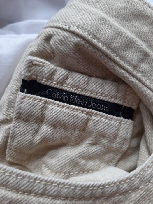 Jeansy beżowe Calvin Klein