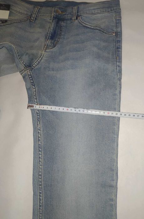 Джинси  ( нові )