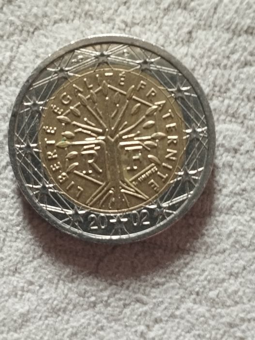 Moedas de 2 euros, Espanha, França e Alemanha.