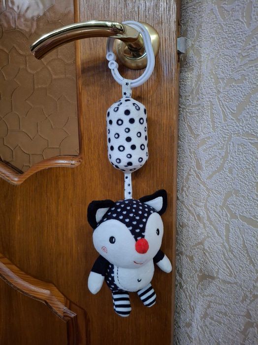 Іграшки на коляску