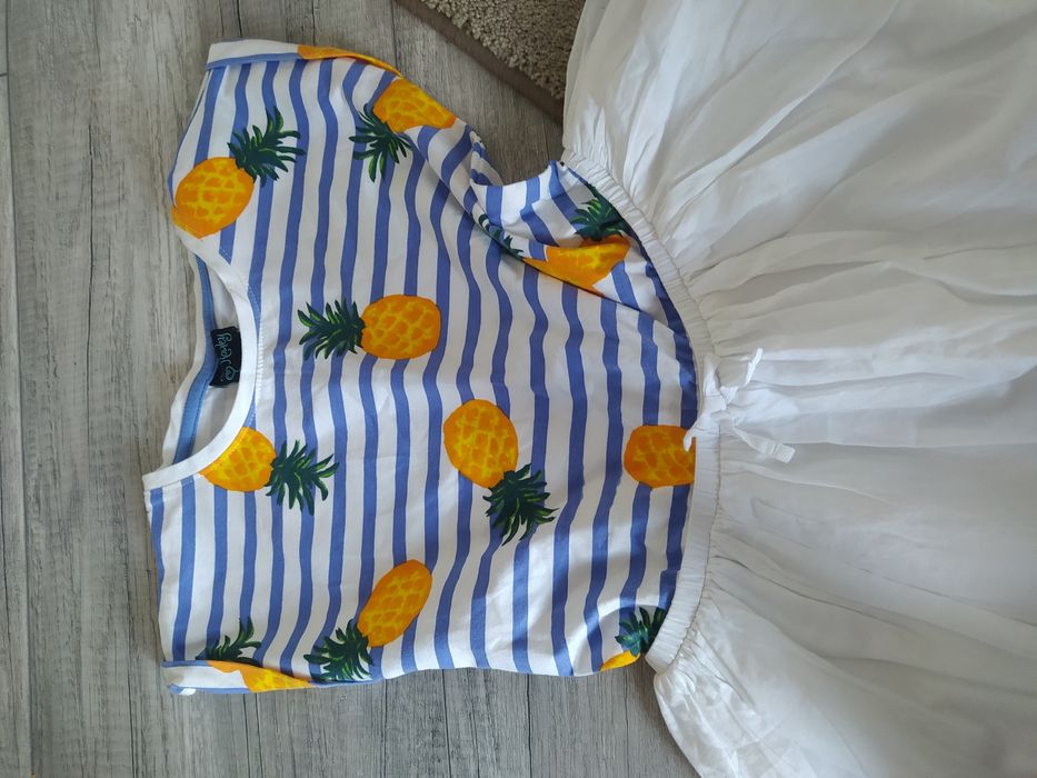 Piękna sukienka 128/134../25zł