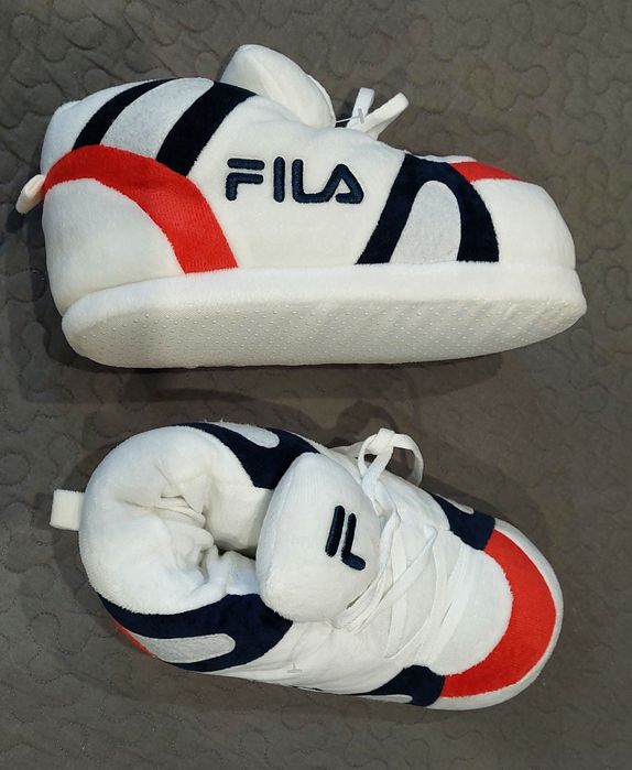 Продам  нові  тапул  іFila