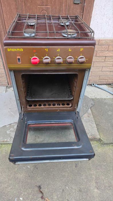 Плита газовая "Электа" 4-х камфорная. коричневая рабочая !