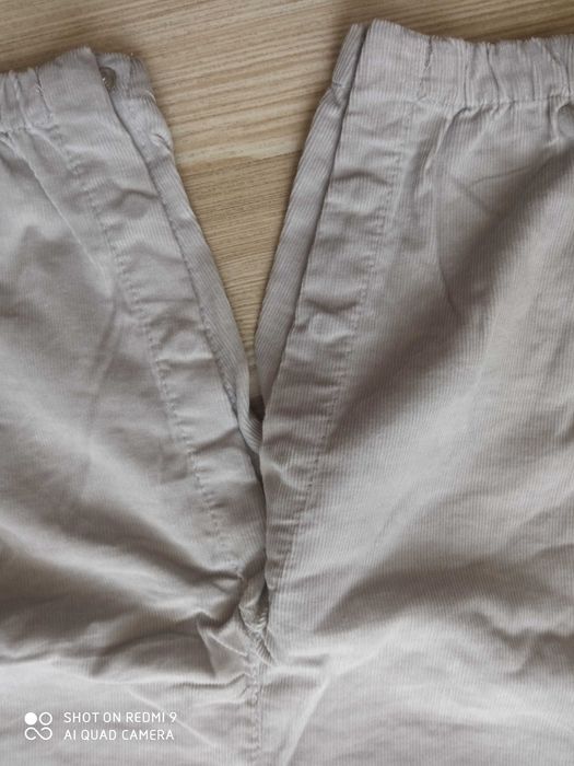 Spodnie ogrodniczki ze Smyka. Rozm. 74 cm.