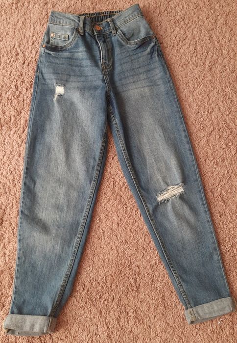 Jeansy dziewczęce rozm.140
