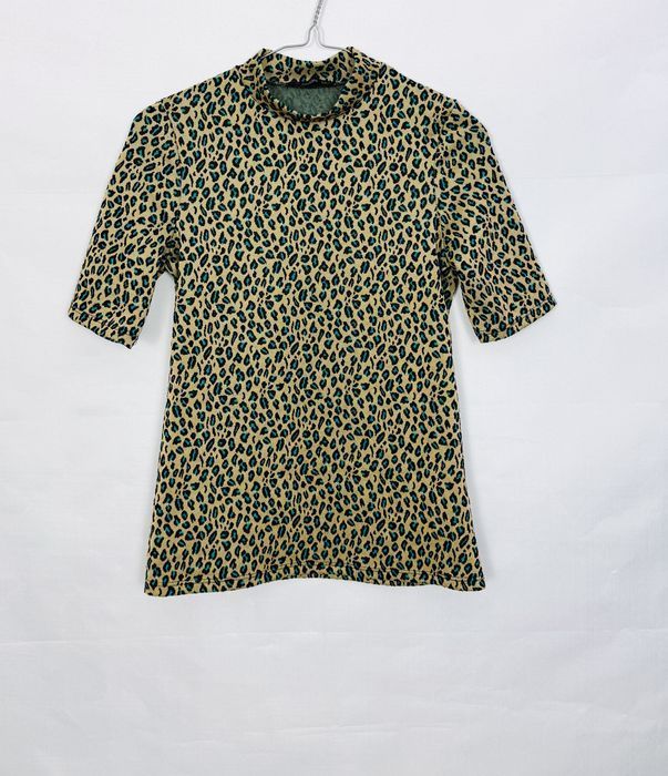 Beżowa bluzka w panterkę z turkusem S 36