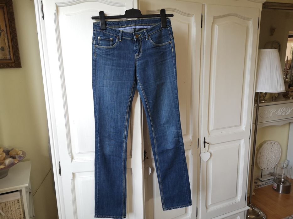 Damskie jeansy: RESERVED - rozm.38